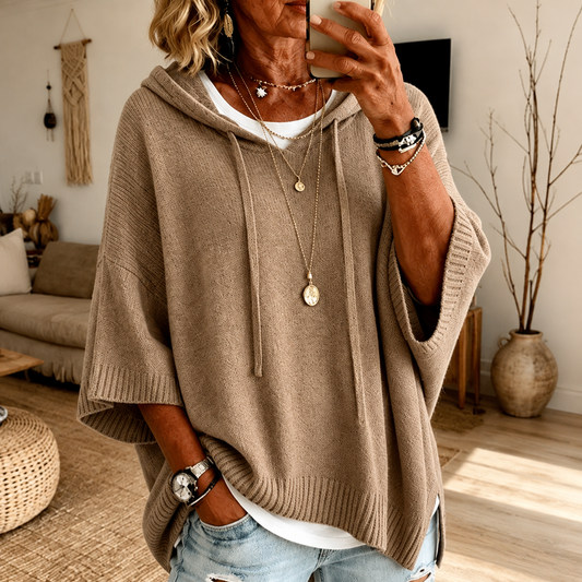 Lucía poncho de punto con capucha en taupe